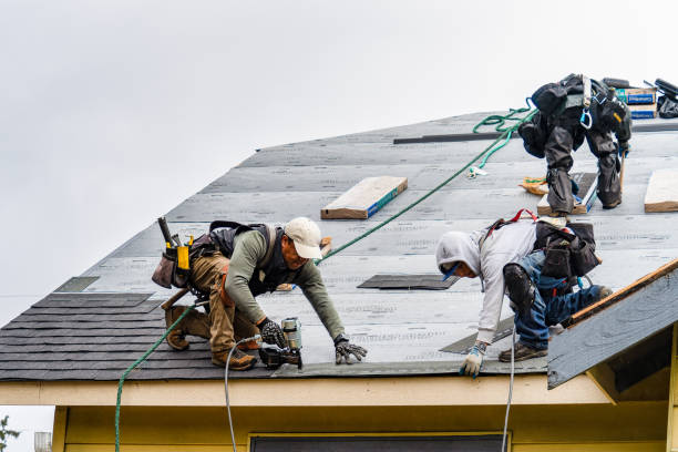 Professional Metal Roofing technician working in Pescadero, CA